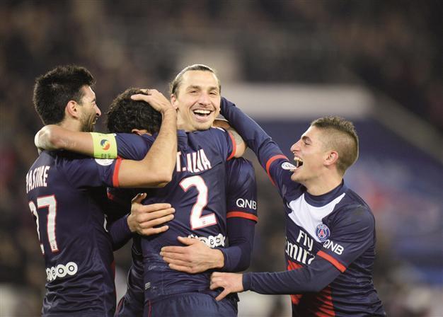 Paris Saint-Germain cling to top spot as rivals close in